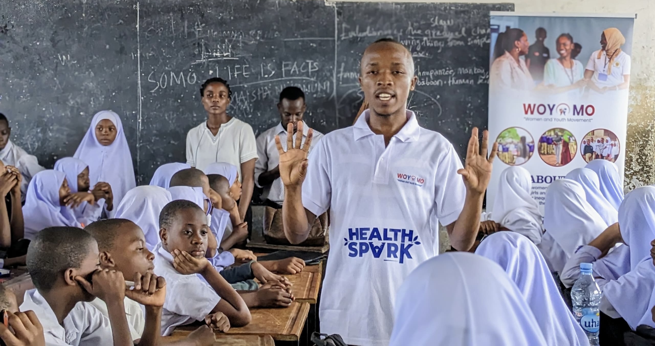 WOYOMO community work in Tanzania — girls and women gathering